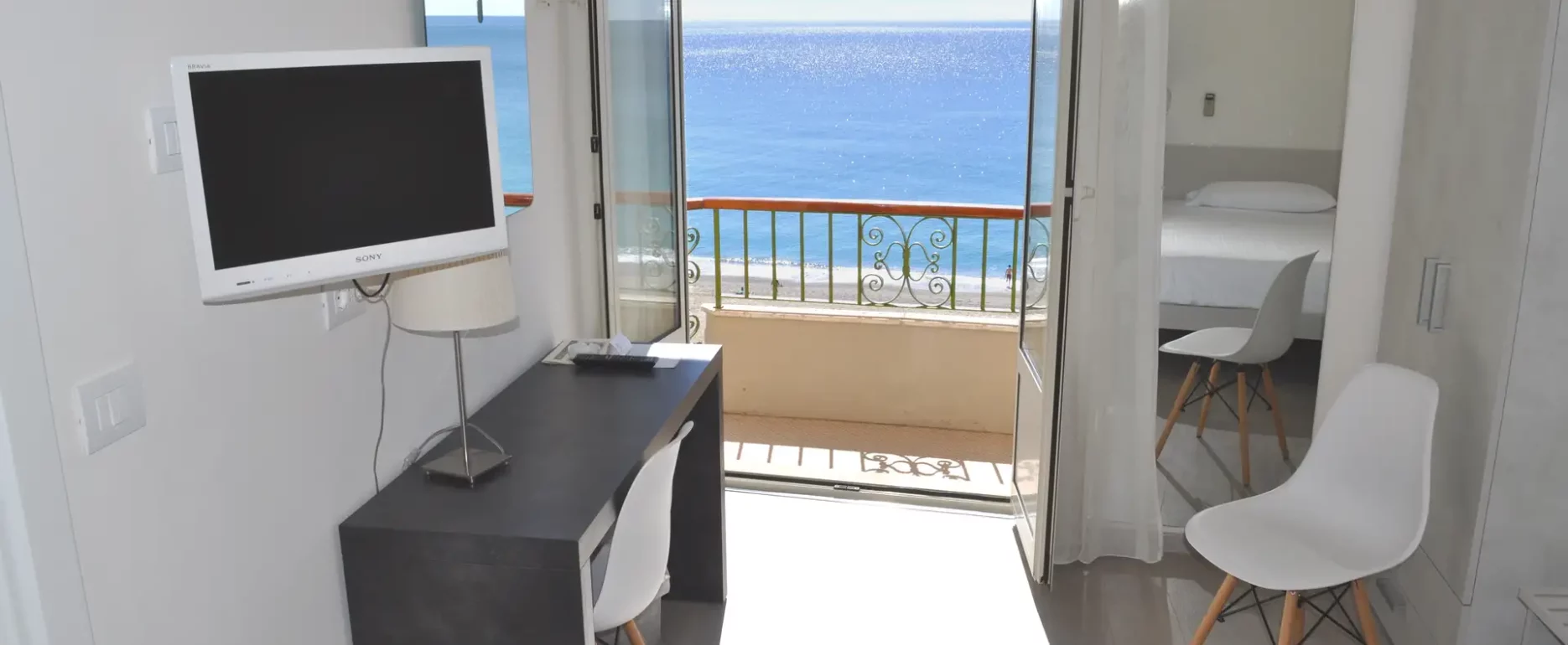 Singola balcone vista mare